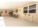 A spacious covered patio with comfortable seating and views of the backyard at 1157 Duncan Dr, Winter Springs, FL 32708