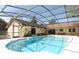 Relaxing screened-in pool area, perfect for entertaining or enjoying quiet moments at 1157 Duncan Dr, Winter Springs, FL 32708
