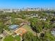 Aerial view featuring baseball diamonds, tennis courts, and a neighborhood view at 128 Waverly Pl # 128, Orlando, FL 32806