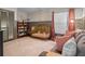 Charming Bedroom with a crib, decorative wall art, and large area rug, creating a cozy space at 128 Waverly Pl # 128, Orlando, FL 32806