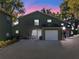 Charming townhome with an attached garage and ample parking on a brick paved drive at 128 Waverly Pl # 128, Orlando, FL 32806