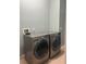 Laundry area with modern washer and dryer units, providing convenience for laundry needs at 13018 S Sunset Ter, Winter Garden, FL 34787