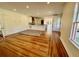 Bright, open-concept living space featuring hardwood floors and recessed lighting at 138 W Stetson Ave, Deland, FL 32720