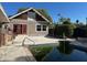 Backyard view of private pool, patio, and partial home exterior at 138 W Stetson Ave, Deland, FL 32720