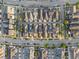 Aerial view of a residential neighborhood with neatly arranged homes, showcasing the property's location and surroundings at 1457 Resolute St, Celebration, FL 34747