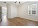 Light and airy bedroom with wood-look flooring, natural light, and recessed lighting at 1457 Resolute St, Celebration, FL 34747