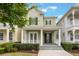 Charming two-story home with inviting porch and well-manicured landscaping at 1457 Resolute St, Celebration, FL 34747