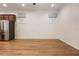 Spacious living room with wood floors, perfect for entertaining at 1457 Resolute St, Celebration, FL 34747