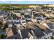 Aerial view of a quiet, residential neighborhood with well-maintained homes and landscaped yards at 1457 Resolute St, Celebration, FL 34747