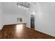Bright open space featuring tile flooring, neutral walls, and a modern light fixture at 1563 W Finland Dr, Deltona, FL 32725