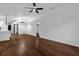 Spacious open-concept living area with modern flooring, ideal for entertaining and relaxation at 1563 W Finland Dr, Deltona, FL 32725