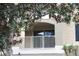Balcony with white railings offering outdoor area to relax in the fresh air at 1969 Summer Club Dr # 209, Oviedo, FL 32765
