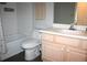 Bathroom features neutral colors, vanity, mirror, and shower-tub combo at 1969 Summer Club Dr # 209, Oviedo, FL 32765