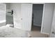 Bedroom with walk-in closet, plush carpeting, and neutral colors at 1969 Summer Club Dr # 209, Oviedo, FL 32765
