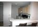Bright kitchen with neutral cabinets, modern appliances, and sleek countertops at 1969 Summer Club Dr # 209, Oviedo, FL 32765