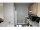 Modern kitchen featuring stainless steel appliances and ample cabinet space at 1969 Summer Club Dr # 209, Oviedo, FL 32765