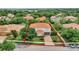 Bird's eye view of home highlighting the tiled roof, backyard, and landscaping at 2107 Rickover Pl, Winter Garden, FL 34787