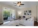 Bright living room with sliding glass doors leading to a screened patio at 2107 Rickover Pl, Winter Garden, FL 34787