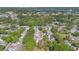 Aerial view showcasing the community's layout and its lush surroundings near the water at 218 Nettlewood Ln, Fern Park, FL 32730