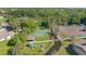 Overhead shot of recreation area offering a playground, sport courts, and lush surroundings at 218 Nettlewood Ln, Fern Park, FL 32730