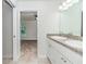 Bright bathroom featuring a double vanity with granite countertops and modern fixtures at 22 Laurel Crse, Ocala, FL 34480