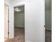 Neutral hallway leading to multiple rooms with plush carpeting for comfort and sound dampening at 22 Laurel Crse, Ocala, FL 34480