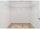 Walk-in closet with carpet flooring and wire shelving for optimal storage solutions at 22 Laurel Crse, Ocala, FL 34480