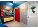 Themed ' bedroom featuring a brick accent wall, bunk bed, and fun Super Mario decor at 2352 Zaballina Pl, Kissimmee, FL 34747