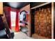 Fun bedroom featuring custom brickwork with shelving and a TV, with curtains and bunk beds visible at 2352 Zaballina Pl, Kissimmee, FL 34747