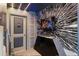 Unique themed bedroom with LED lighting, futuristic wall designs, and a mounted TV at 2352 Zaballina Pl, Kissimmee, FL 34747