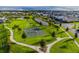 This aerial view shows a park basketball court within the residential community at 2352 Zaballina Pl, Kissimmee, FL 34747