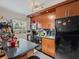 Well-equipped kitchen featuring sleek countertops and appliances at 2507 E Central Blvd # 21, Orlando, FL 32803