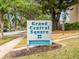 Grand Central Square community sign amidst lush greenery at 2507 E Central Blvd # 21, Orlando, FL 32803
