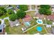 This aerial shot features the home with its pool and the surrounding residential area at 2622 Jennifer Dr, Lakeland, FL 33810