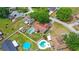 This aerial view showcases the property’s layout, pool, landscaping, and neighborhood at 2622 Jennifer Dr, Lakeland, FL 33810