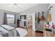Inviting bedroom featuring personal touches, ample storage, and plenty of natural light at 2622 Jennifer Dr, Lakeland, FL 33810
