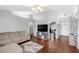 Spacious living room with neutral tones, vaulted ceiling, and an open layout for entertaining at 2622 Jennifer Dr, Lakeland, FL 33810