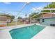 The clean, well-maintained, private pool is surrounded by a screened enclosure at 2622 Jennifer Dr, Lakeland, FL 33810