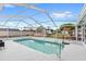 The home has a private screened-in pool that offers relaxation and recreation at 2622 Jennifer Dr, Lakeland, FL 33810