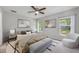 Serene primary bedroom featuring soft lighting, neutral decor, and coordinated furniture at 304 Woods Landing Dr, Lady Lake, FL 32159