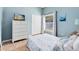 Bright and airy bedroom with a double closet, stylish furniture, and serene decor at 3469 Foxton Ct, Oviedo, FL 32765