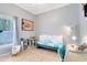 Cozy bedroom featuring a daybed, desk, and natural light from the window at 3469 Foxton Ct, Oviedo, FL 32765