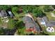 Spacious home features private waterfront access and lush landscaping, captured in an aerial view at 3655 E Osceola Rd, Geneva, FL 32732