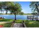 Brick paver pathway leads to the waterfront dock at 3655 E Osceola Rd, Geneva, FL 32732