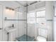Cozy bathroom featuring white subway tile and a glass enclosed walk-in shower at 3655 E Osceola Rd, Geneva, FL 32732