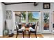Cozy dining area with view of the backyard and water at 3655 E Osceola Rd, Geneva, FL 32732