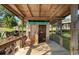 Unique waterfront dock with rustic details including street signage and vintage decor at 3655 E Osceola Rd, Geneva, FL 32732
