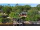 Charming riverfront home with lush landscaping, a private dock, and a cozy, inviting facade at 3655 E Osceola Rd, Geneva, FL 32732