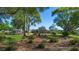 Charming single-story home boasts mature landscaping, lush green lawn and a welcoming facade at 3655 E Osceola Rd, Geneva, FL 32732