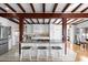 Modern kitchen with granite island, white cabinetry and stainless steel appliances at 3655 E Osceola Rd, Geneva, FL 32732